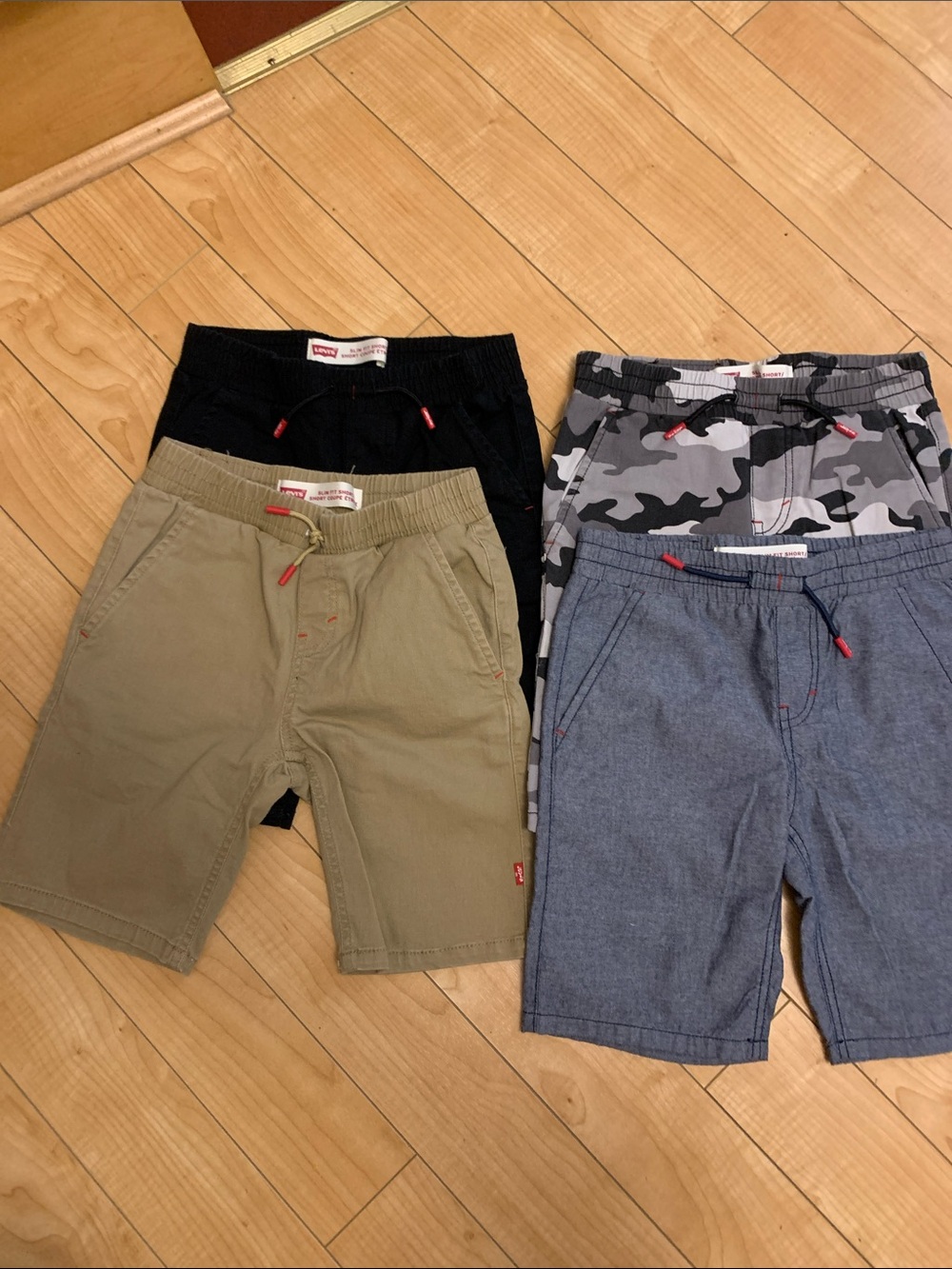 Levi's Boys 4-Pack Shorts in Black, Khaki, Camo & Chambray